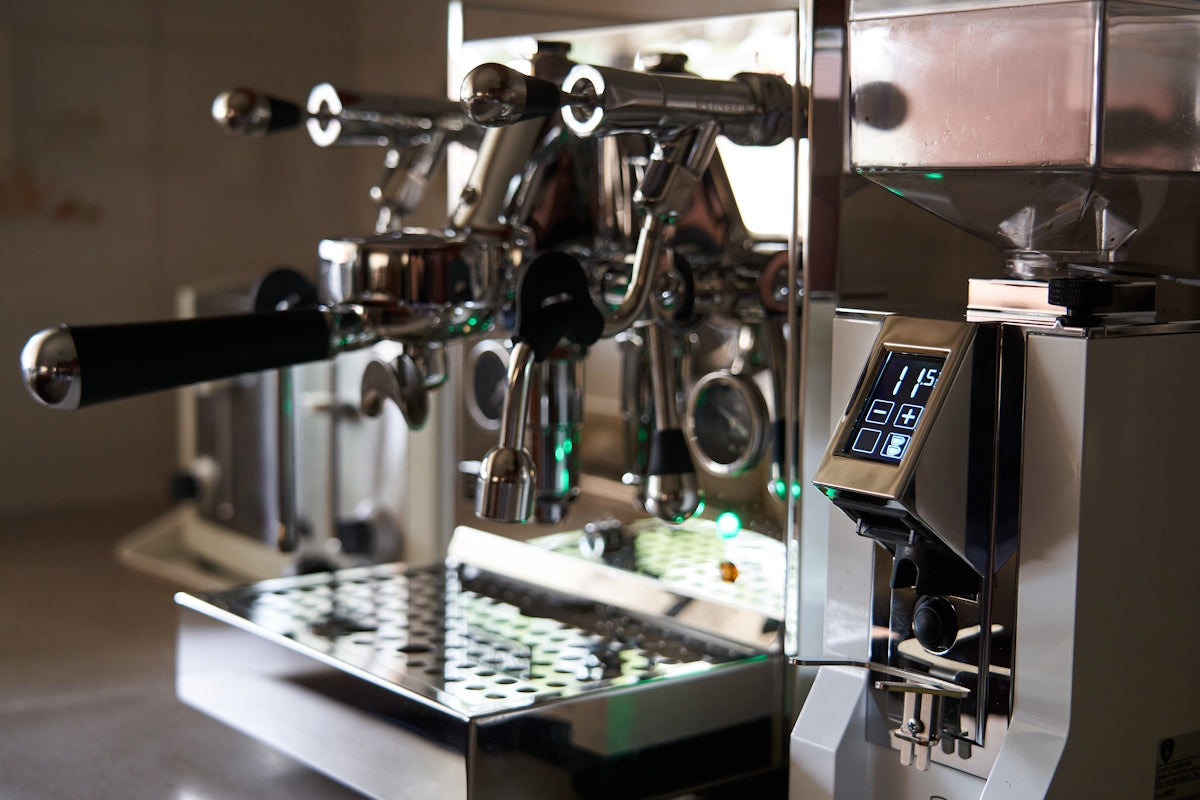 silver and black coffee machine