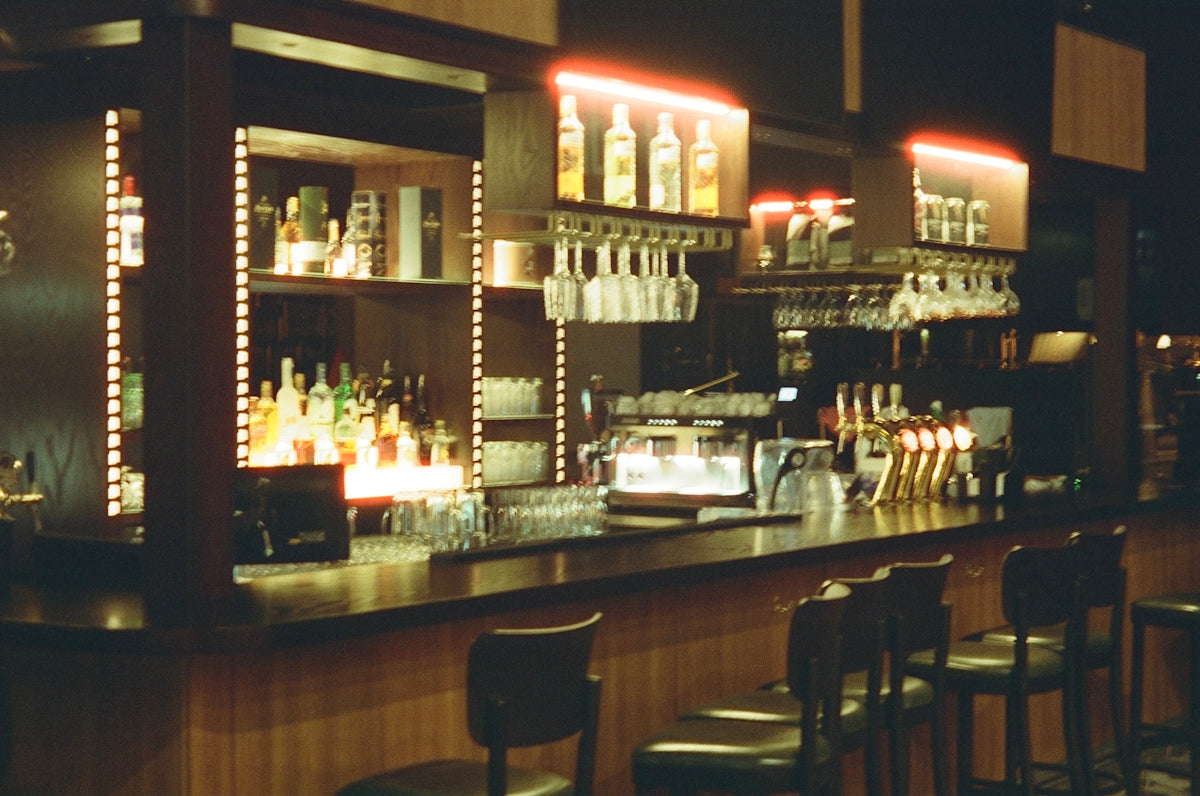 a bar with a lot of bottles on it